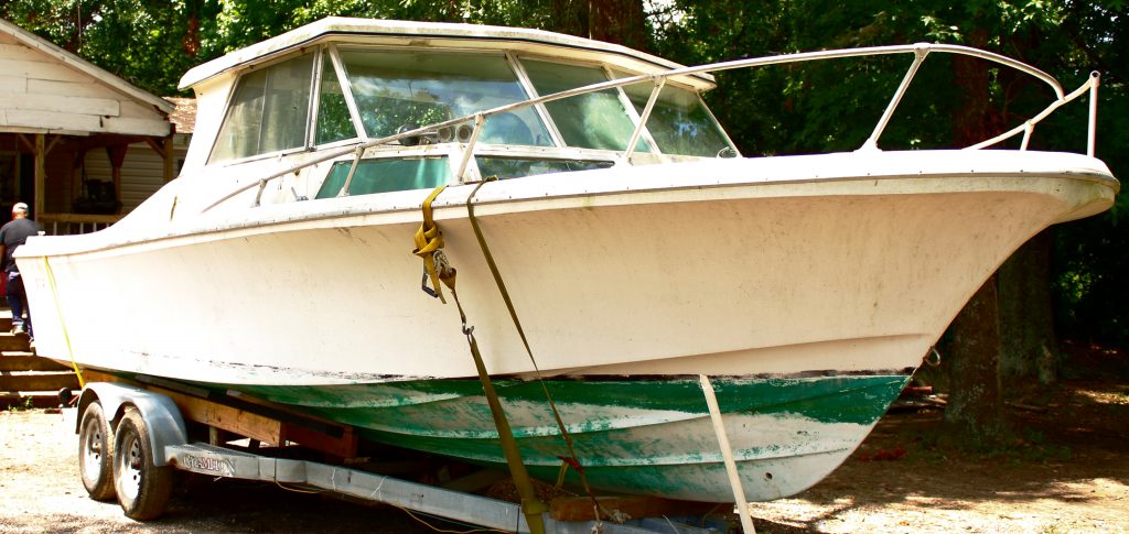 The bow picture of the 1969 SportCraft 27 I'm buying as a restoration project. How hard can it be?